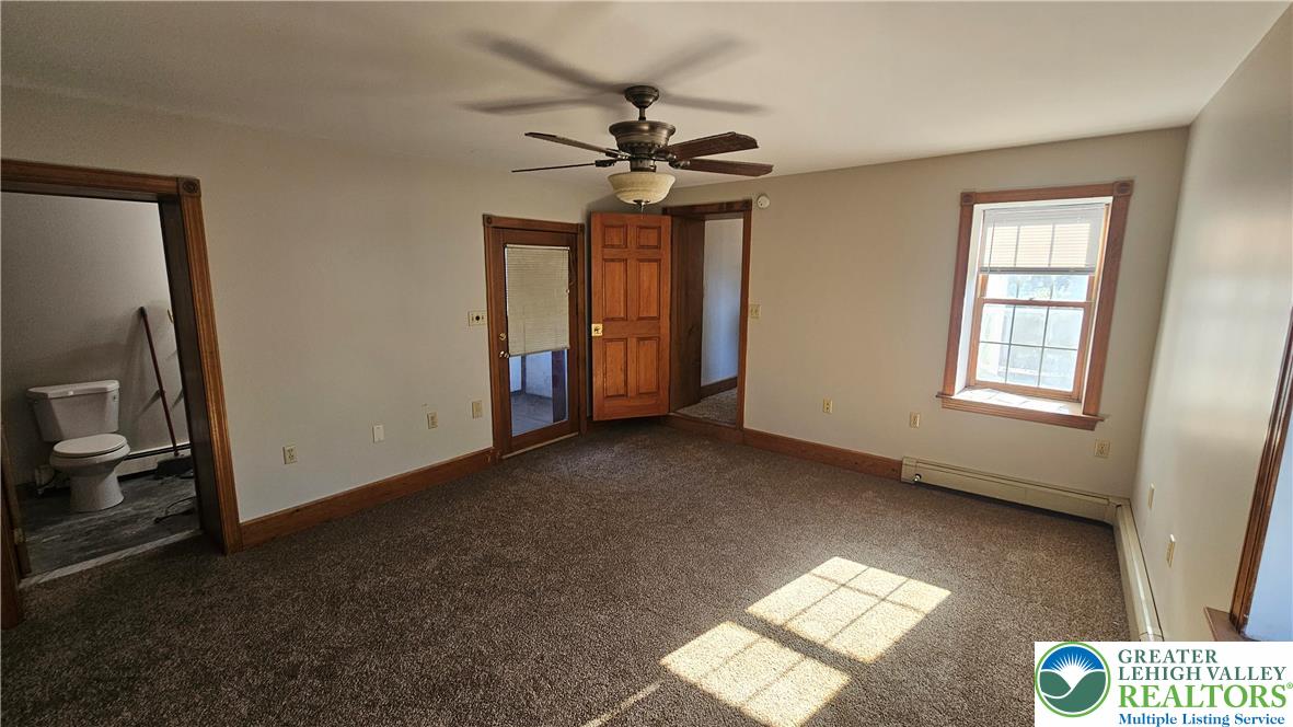 253 West Main Street Bath, PA 18014 - Photo 18 of 30 a view of a livingroom with a ceiling fan and window