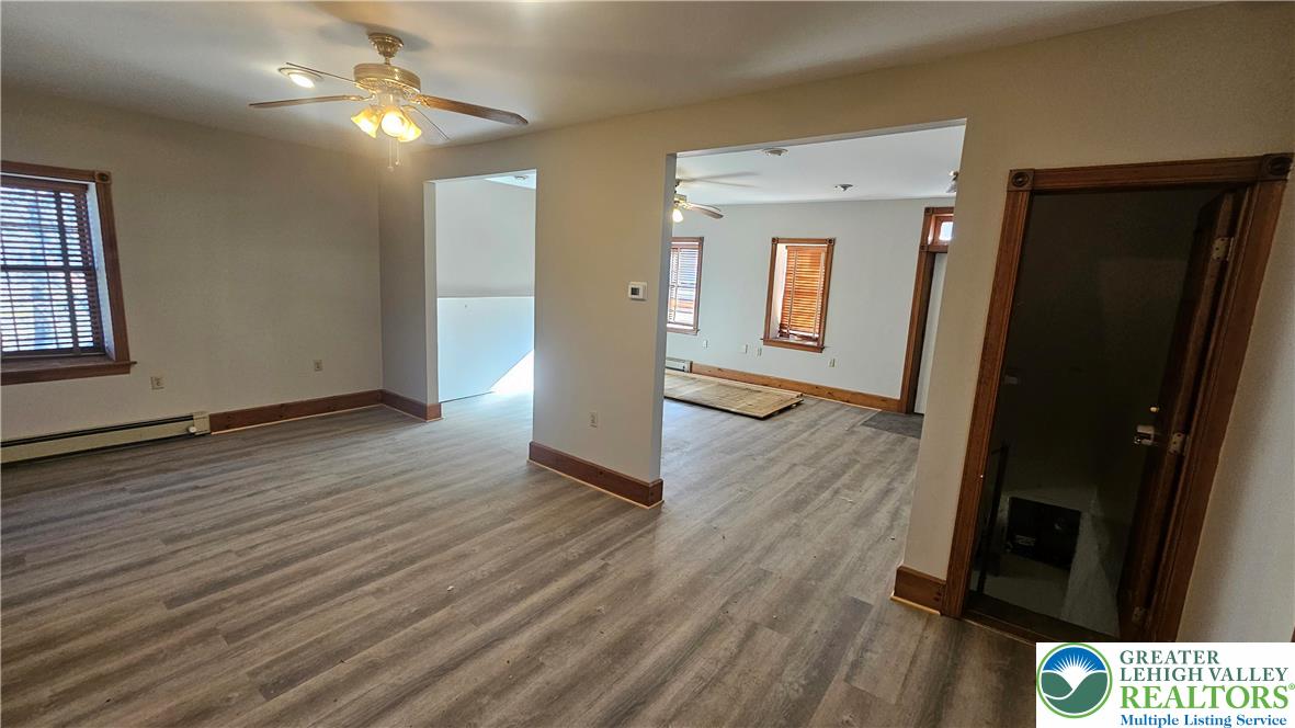 253 West Main Street Bath, PA 18014 - Photo 9 of 30 wooden floor in an empty room with a window