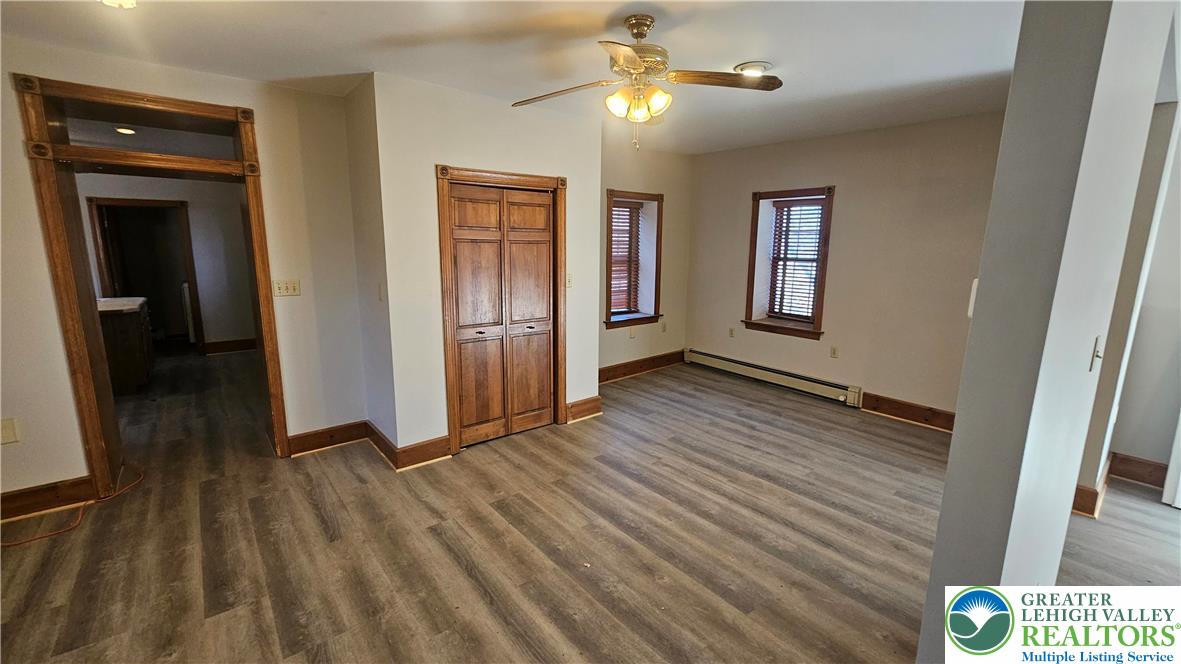 253 West Main Street Bath, PA 18014 - Photo 10 of 30 wooden floor in an empty room with a window