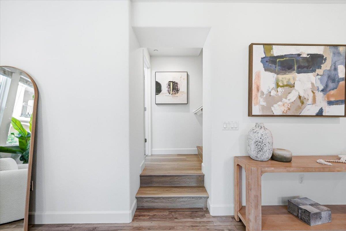 5614 Oceanspray Road Newark, CA 94560 - Photo 18 of 52 a view of a hallway with entryway wooden floor and front door