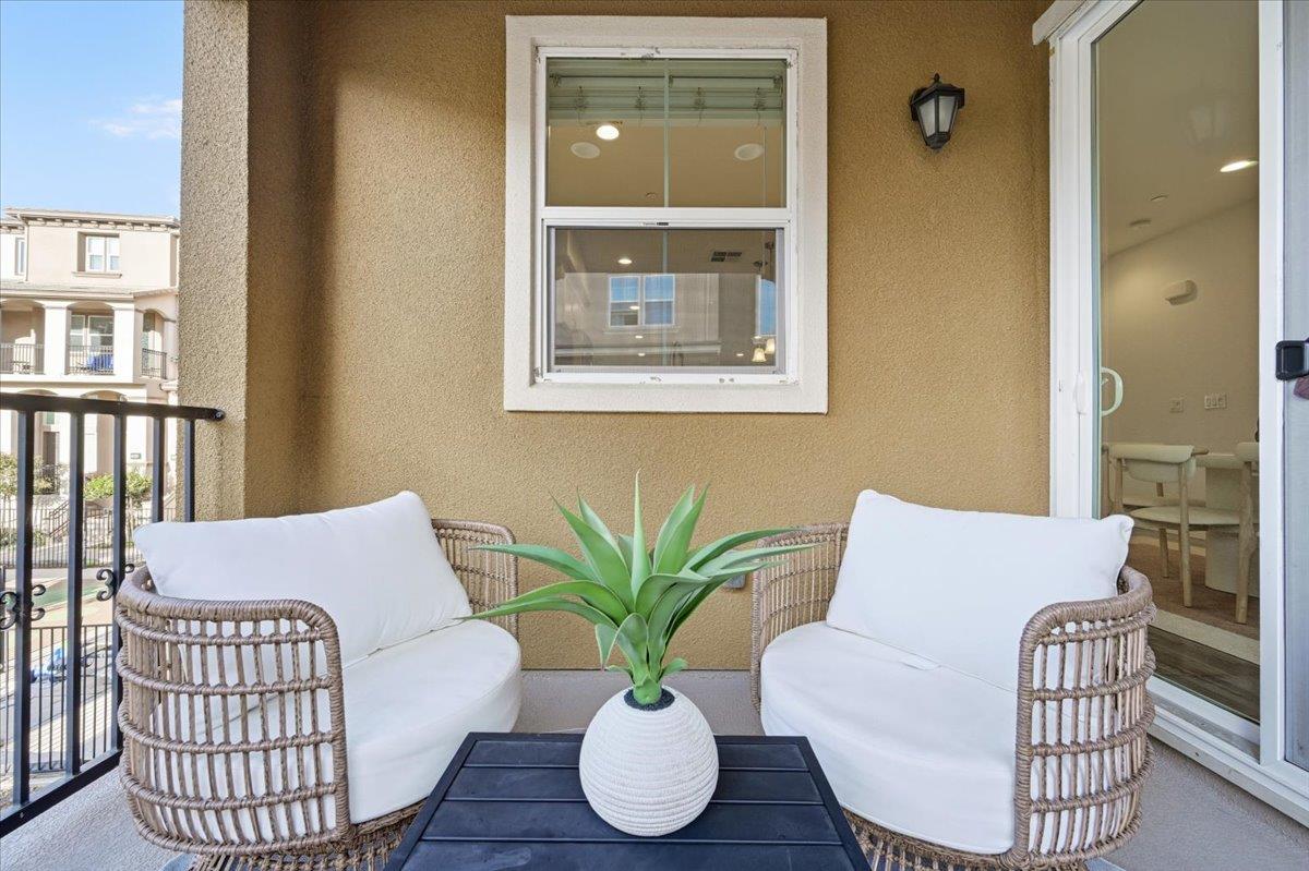 5614 Oceanspray Road Newark, CA 94560 - Photo 42 of 52 a living room with furniture and a potted plant
