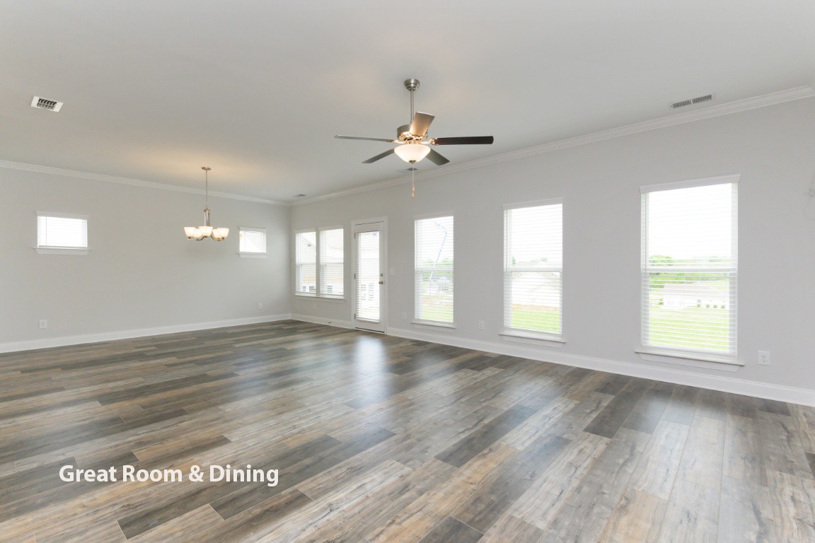 7122 Pepper Tree Circle Fairview, TN 37062 - Photo 25 of 31 a view of an empty room with wooden floor and a window