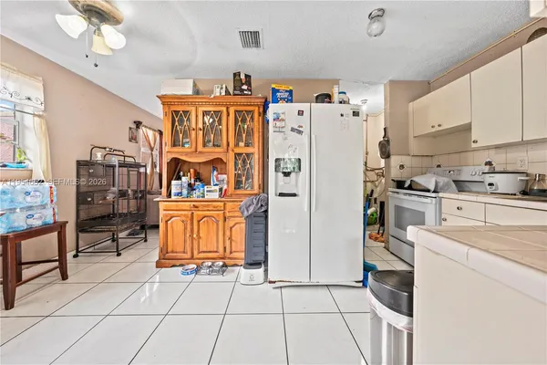 a bed room with bed and window