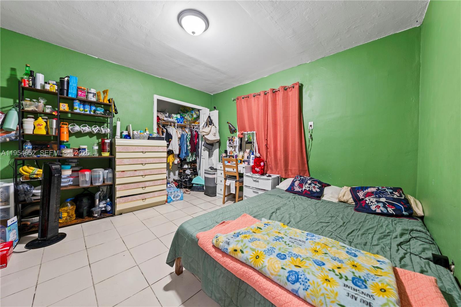 2110 Northwest 34th Street Miami, FL 33142 - Photo 28 of 33 a bed room with furniture and a baby crib