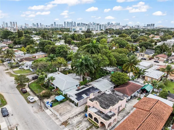 an aerial view of a city with lots of residential buildings