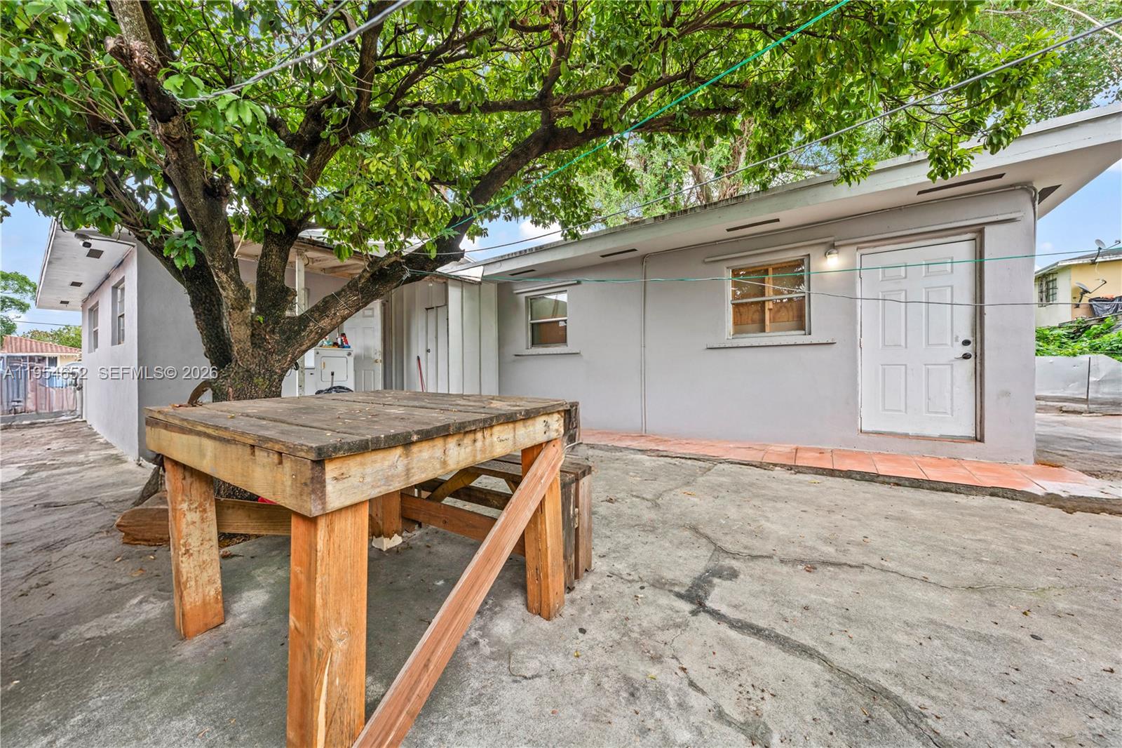 2110 Northwest 34th Street Miami, FL 33142 - Photo 33 of 33 a house view with a outdoor space