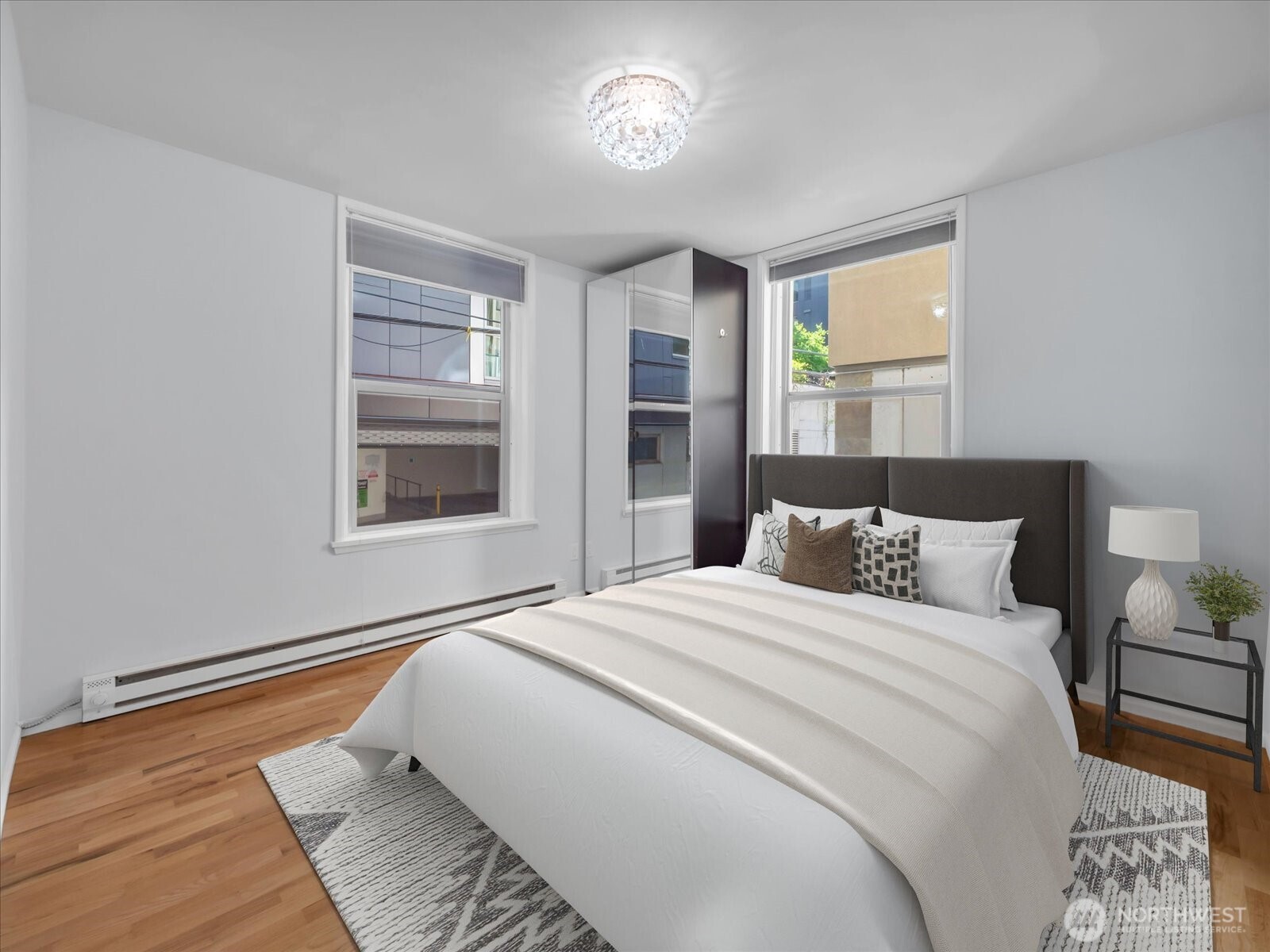 7 Harrison Street, Unit 17 Seattle, WA 98109 - Photo 6 of 20 a bedroom with a large bed and a window