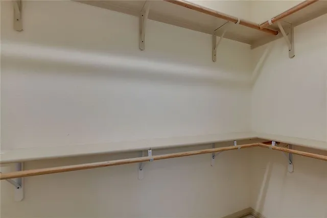 a view of a room with racks on the wall