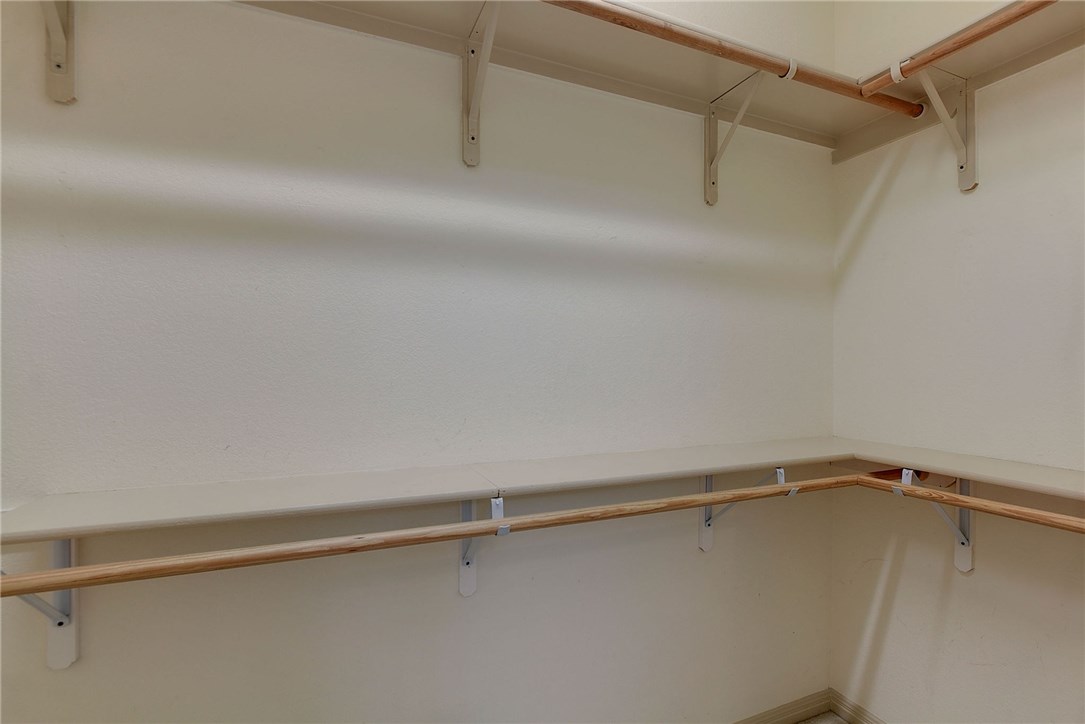 2993 Freemont Street Round Rock, TX 78681 - Photo 20 of 32 a view of a room with racks on the wall