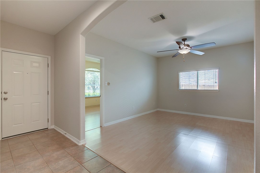 2993 Freemont Street Round Rock, TX 78681 - Photo 21 of 32 an empty room with fan and windows
