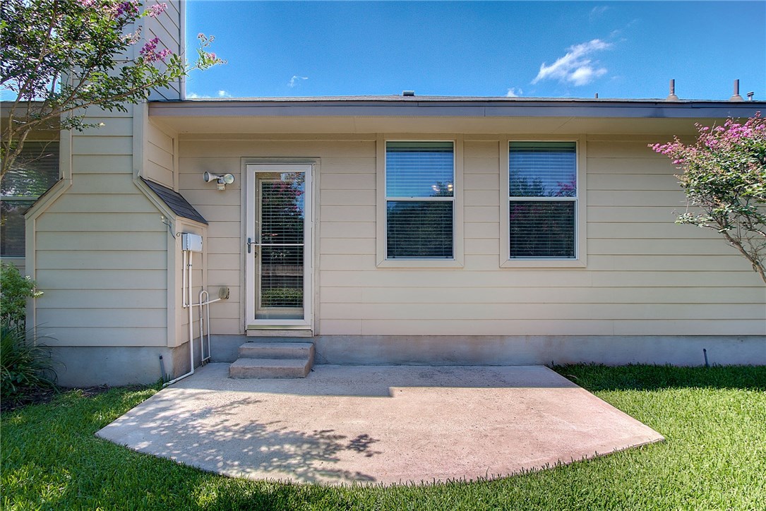 2993 Freemont Street Round Rock, TX 78681 - Photo 29 of 32 a view of a house with a small yard