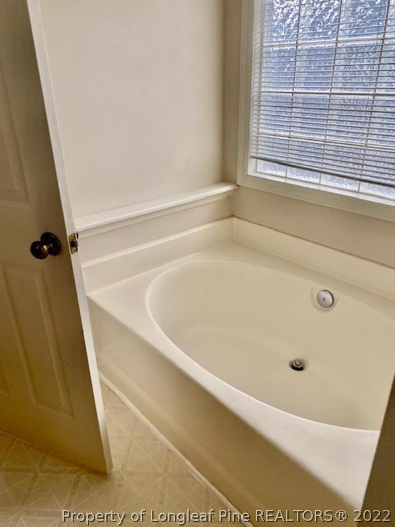 1945 Sardonyx Road, Unit 4 Fayetteville, NC 28303 - Photo 11 of 17 a bathroom with bathtub