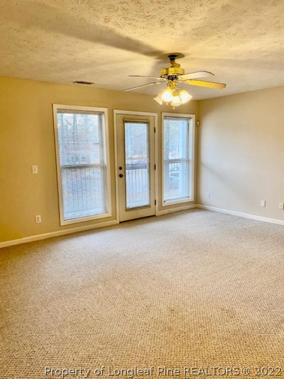 1945 Sardonyx Road, Unit 4 Fayetteville, NC 28303 - Photo 17 of 17 a view of an empty room with a window