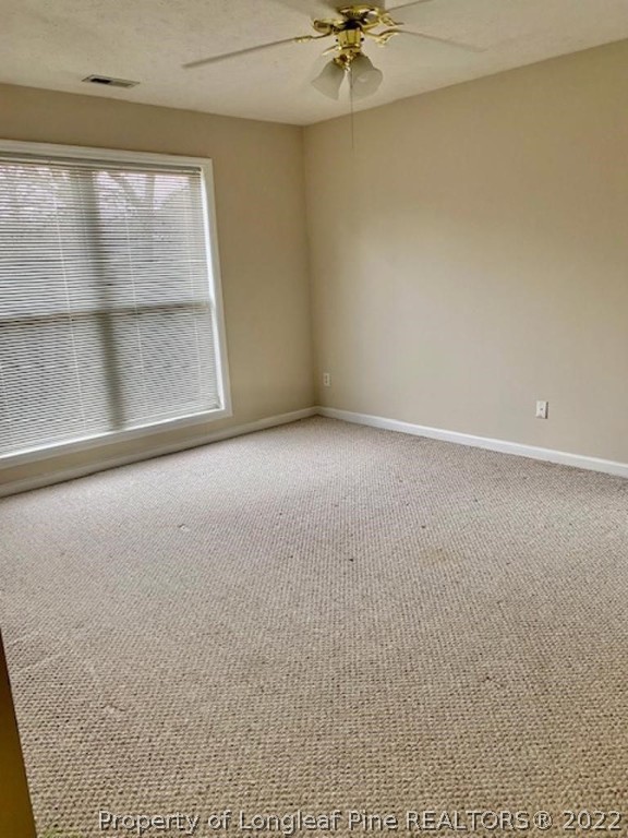 1945 Sardonyx Road, Unit 4 Fayetteville, NC 28303 - Photo 6 of 17 a view of an empty room with a window