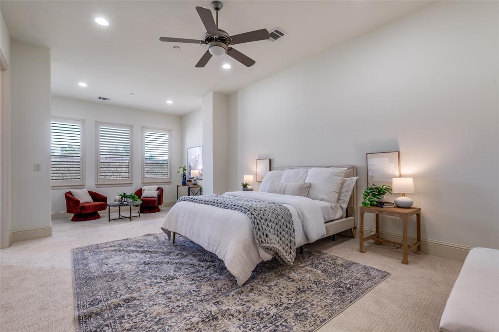 14739 Stanford Court Addison, TX 75254 - Photo 11 of 26 Spacious primary bedroom with an incredible sitting area—ideal for a home office, reading nook, or cozy retreat.