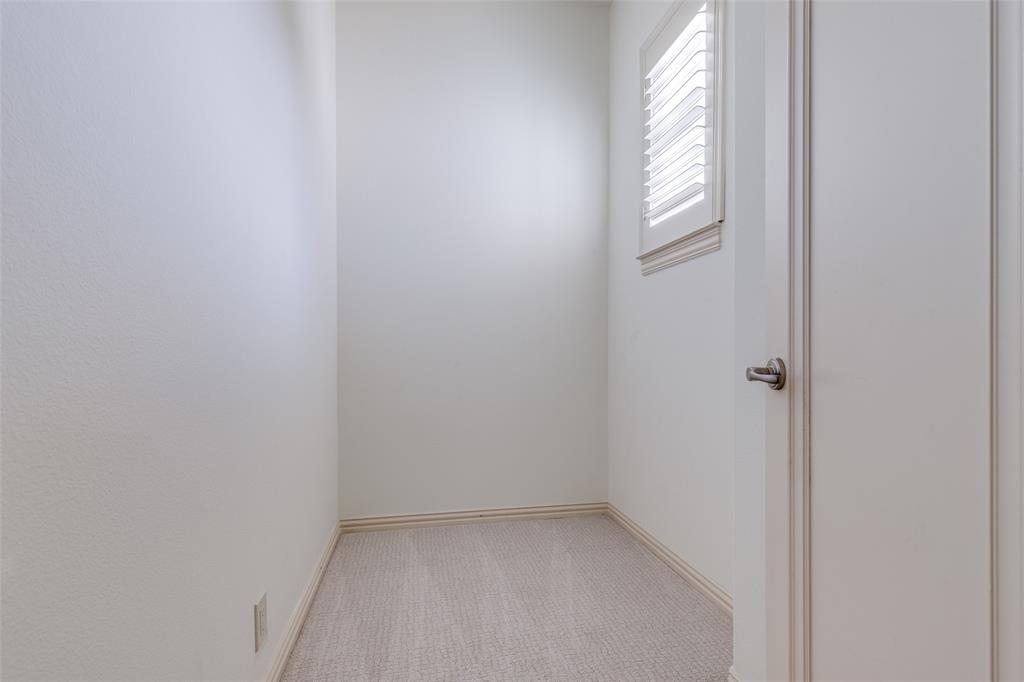 14739 Stanford Court Addison, TX 75254 - Photo 20 of 26 Bonus room on the second floor can be used for extra storage or a small flex space!