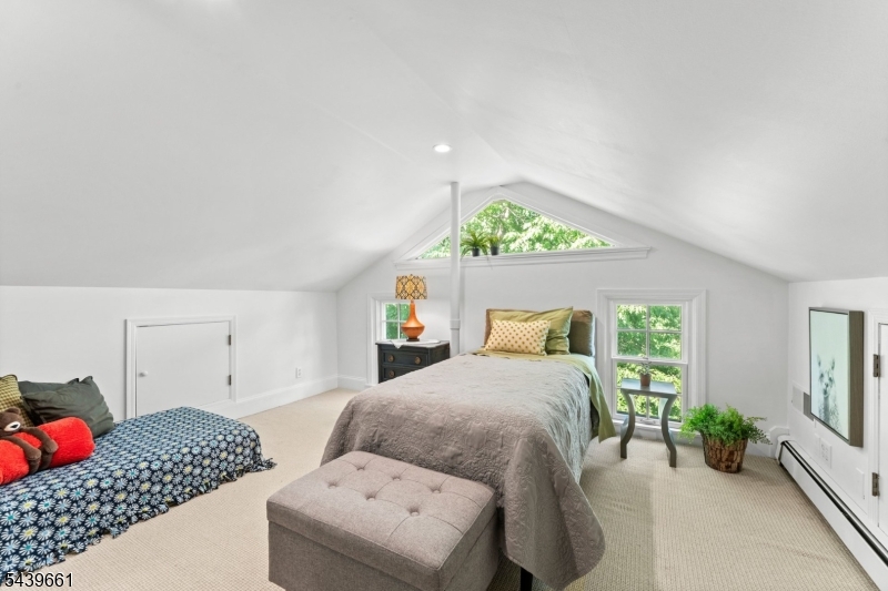 29 Bedens Brook Road Skillman, NJ 08558 - Photo 40 of 50 a bedroom with a bed and a couch