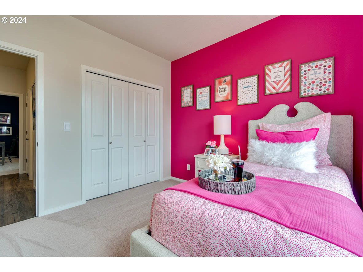 2755 V Street Springfield, OR 97477 - Photo 4 of 20 a bedroom with a bed and a dresser