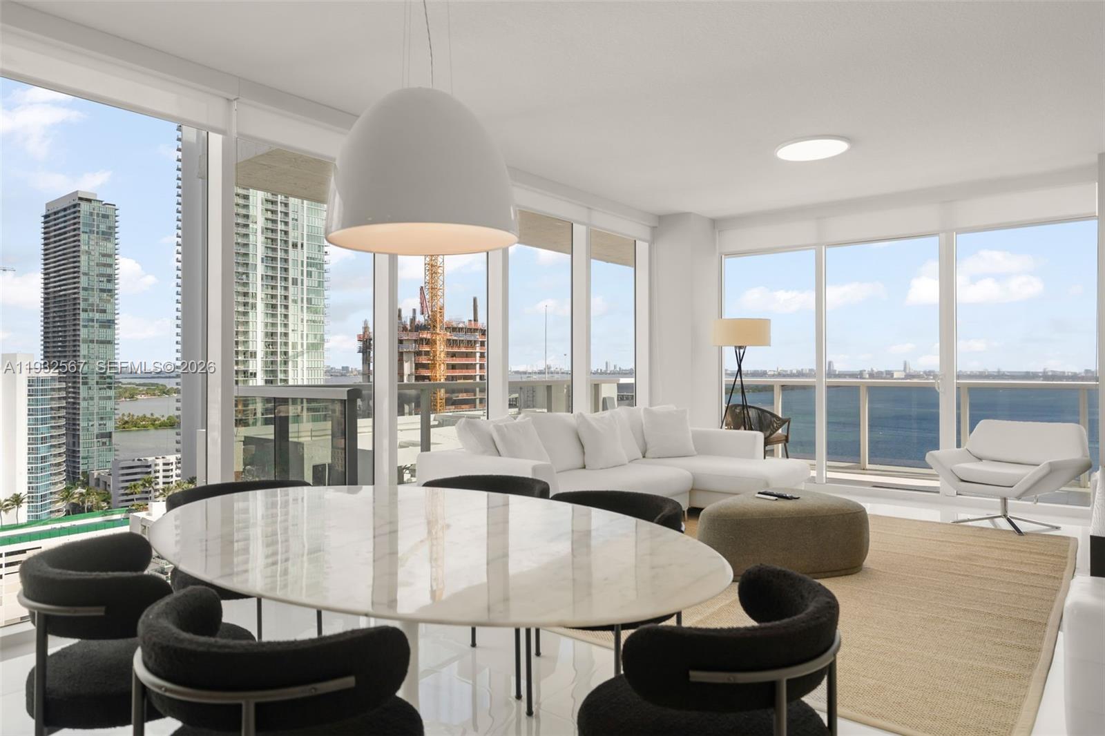 600 Northeast 27th Street, Unit 2401 Miami, FL 33137 - Photo 3 of 52 a living room with furniture and a large window