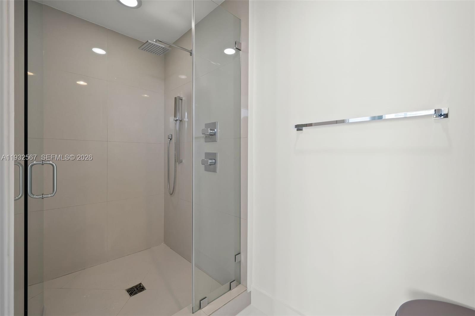 600 Northeast 27th Street, Unit 2401 Miami, FL 33137 - Photo 33 of 52 a bathroom with a shower