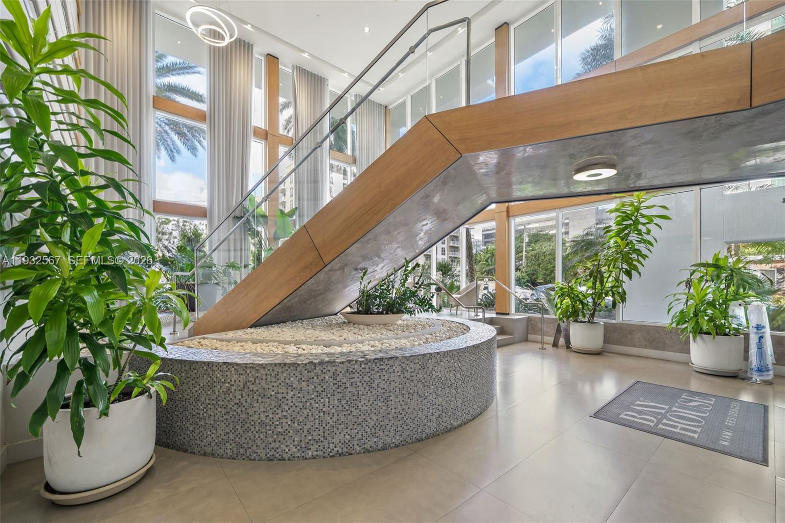 600 Northeast 27th Street, Unit 2401 Miami, FL 33137 - Photo 39 of 52 a potted plant sitting on the side of a building