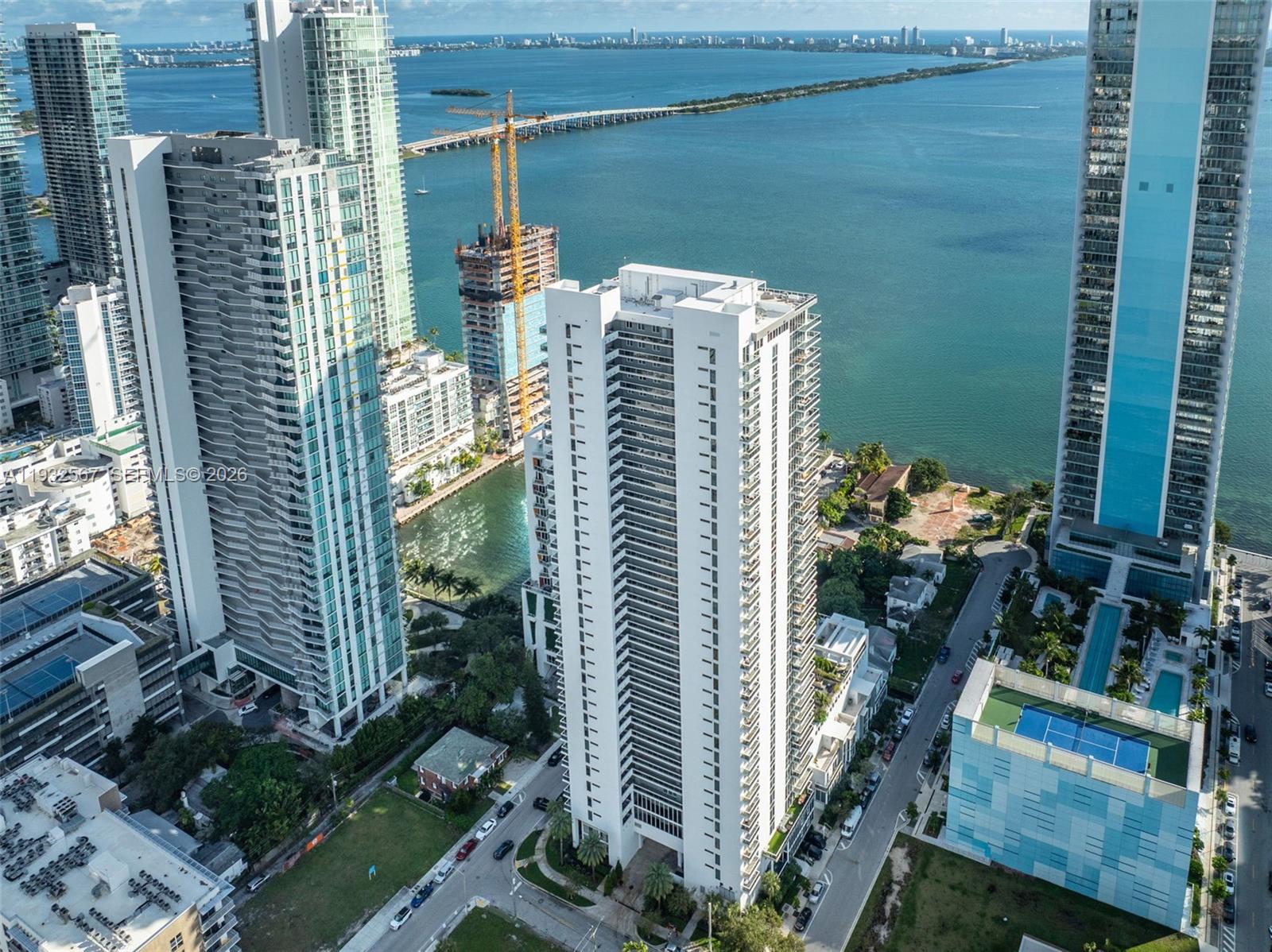 600 Northeast 27th Street, Unit 2401 Miami, FL 33137 - Photo 46 of 52 a balcony with a potted plant and outdoor space
