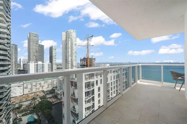 a view of a balcony with city view