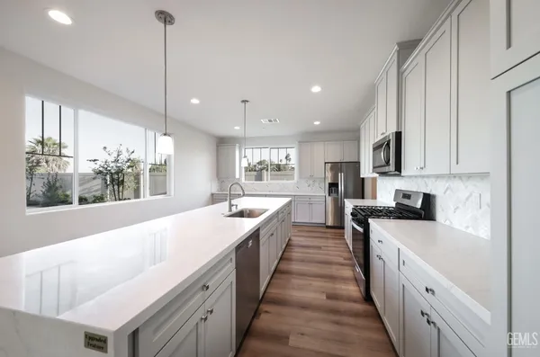 a view of a swimming pool with a yard