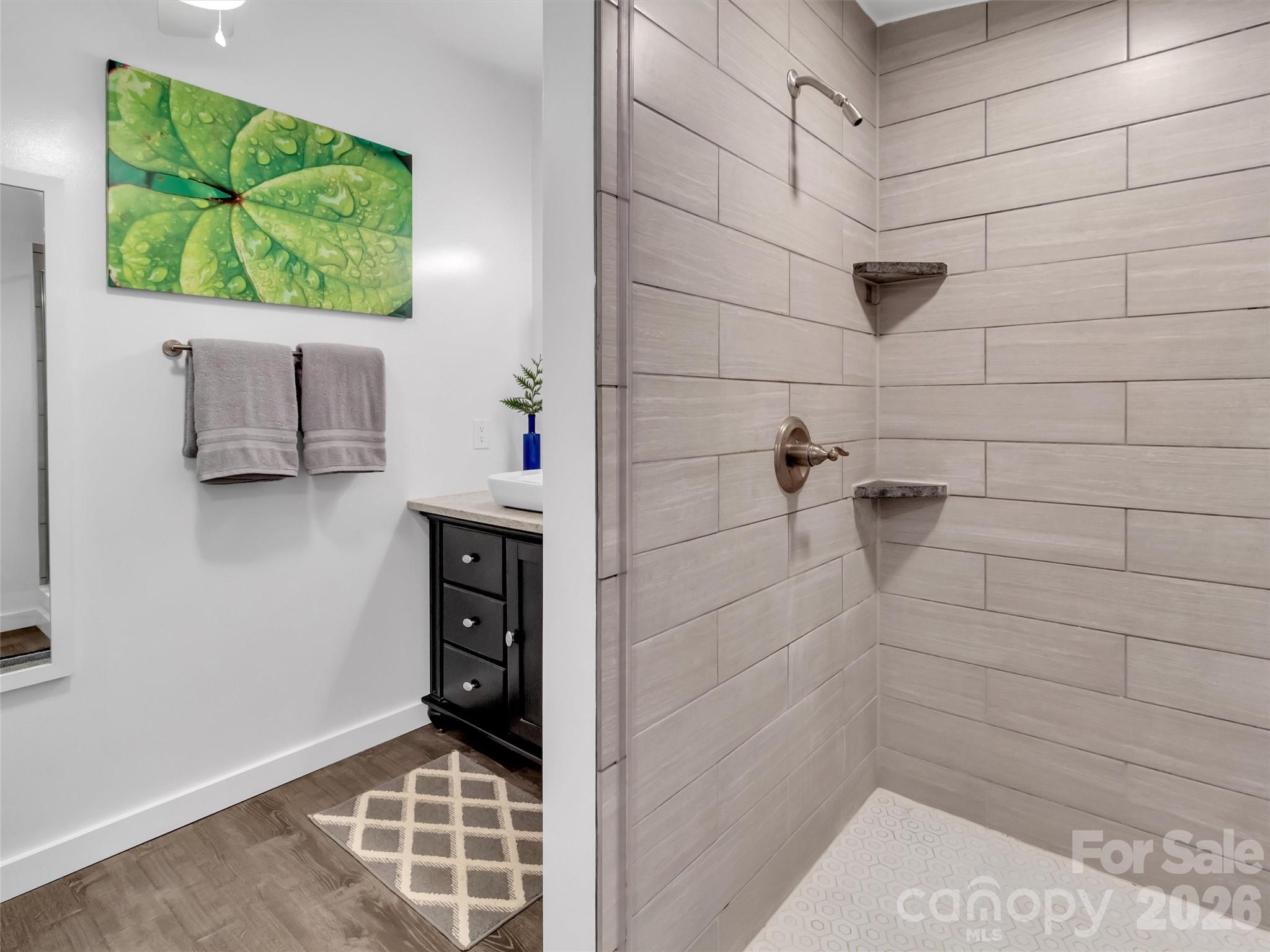 70 Icicle Ridge Road Sylva, NC 28779 - Photo 17 of 24 a bathroom with a shower