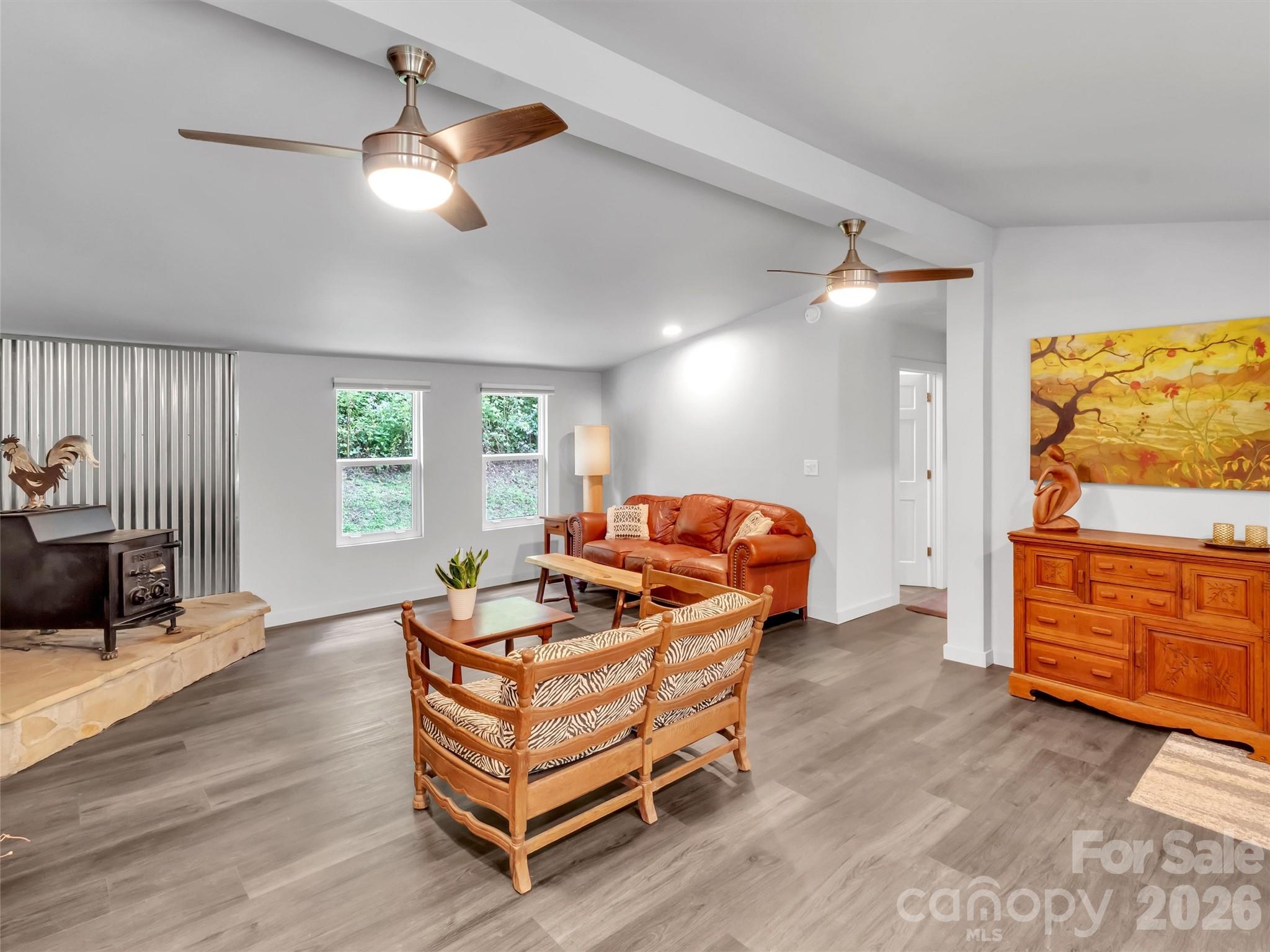 70 Icicle Ridge Road Sylva, NC 28779 - Photo 5 of 24 a bedroom with furniture and a window
