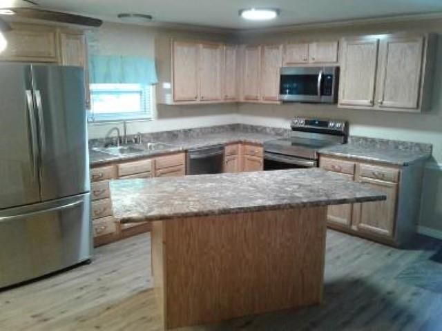 106 Putnam Loop Road Melrose, FL 32666 - Photo 10 of 28 a kitchen with granite countertop a refrigerator and a stove top oven