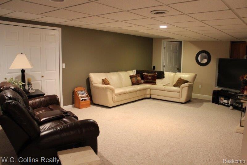 4079 Ridge Side Drive Rochester, MI 48306 - Photo 23 of 29 25 basement family room.jpg