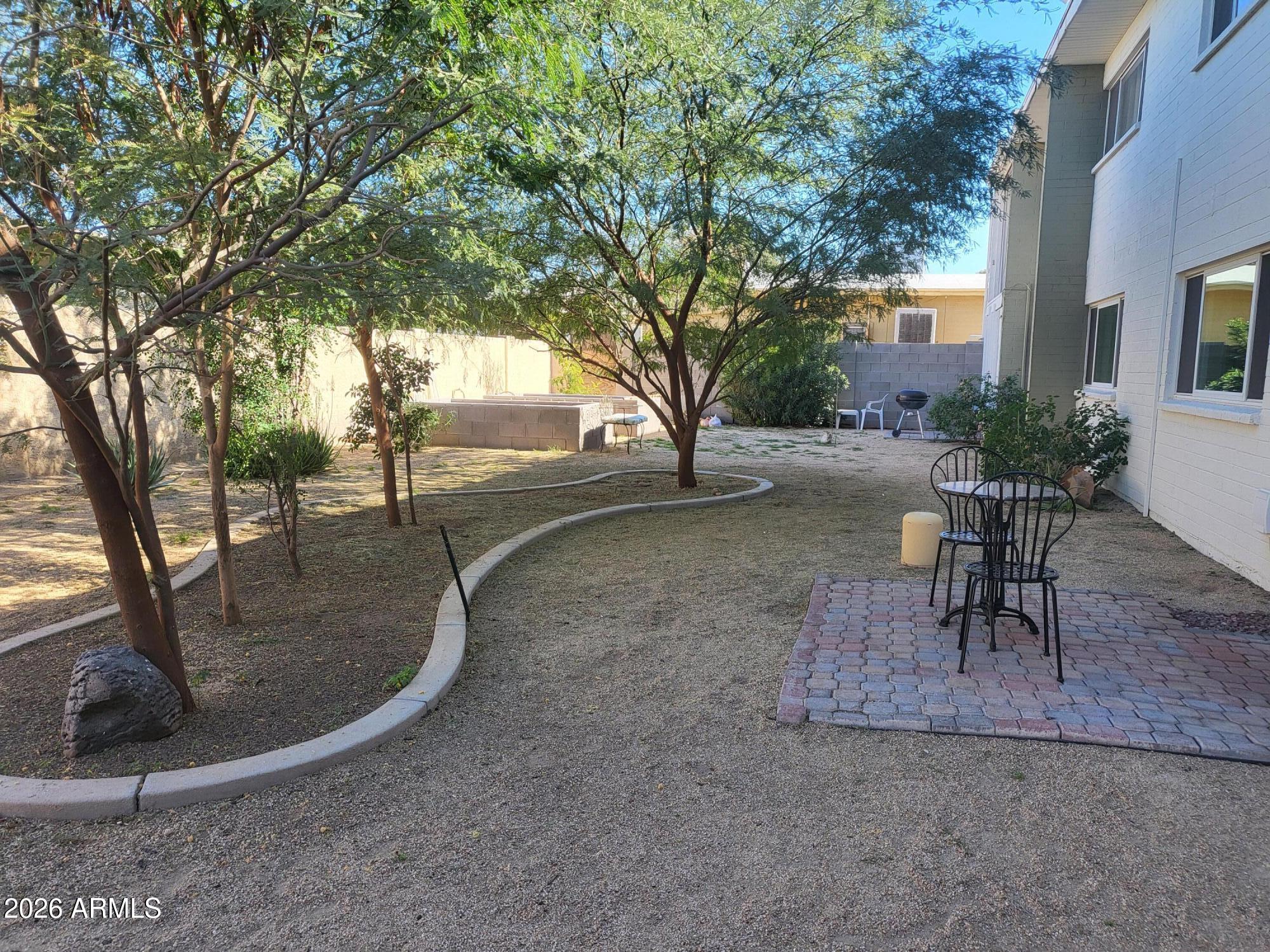 825 North Hayden Road, Unit C108 Scottsdale, AZ 85257 - Photo 12 of 34 a view of a yard with a slide