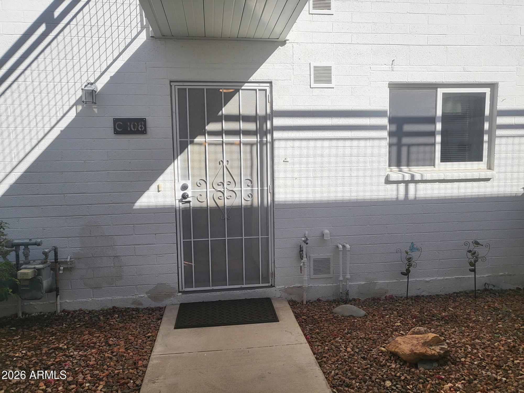 825 North Hayden Road, Unit C108 Scottsdale, AZ 85257 - Photo 28 of 34 a view of a pathway of a house