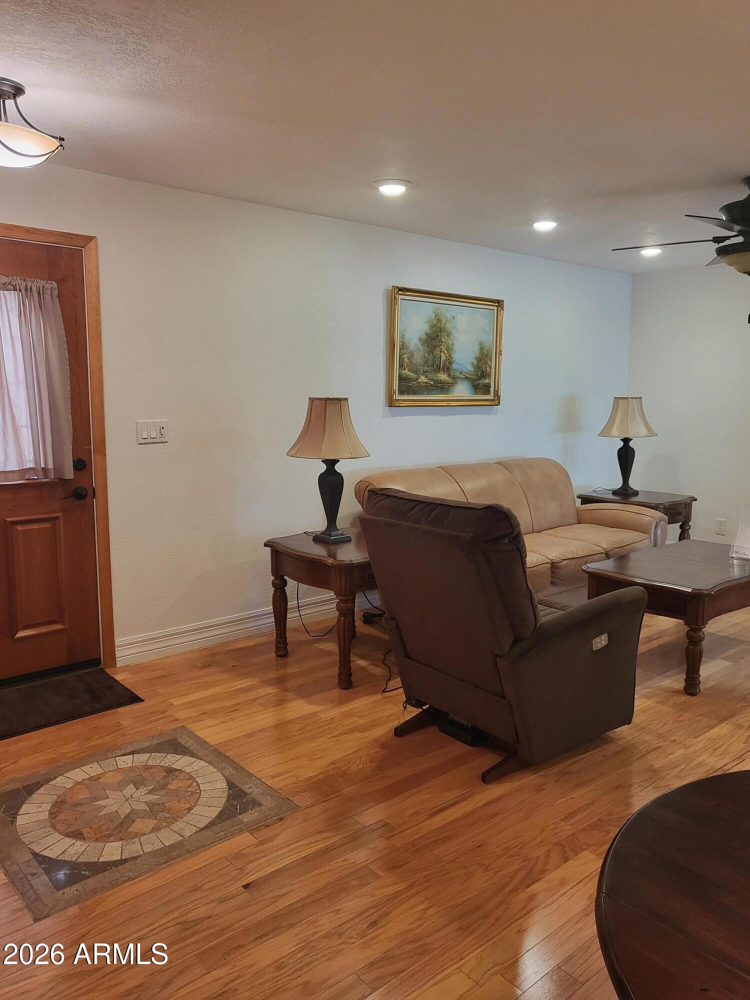 825 North Hayden Road, Unit C108 Scottsdale, AZ 85257 - Photo 5 of 34 a living room with furniture
