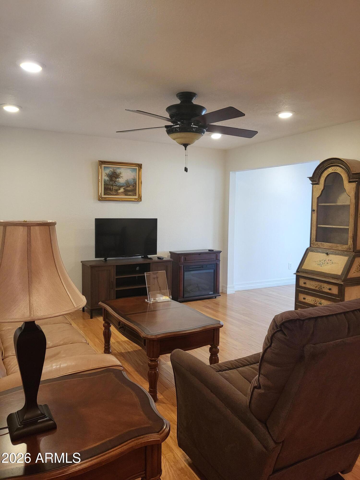 825 North Hayden Road, Unit C108 Scottsdale, AZ 85257 - Photo 7 of 34 a living room with furniture
