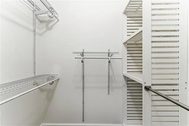 a view of a room with racks on the wall