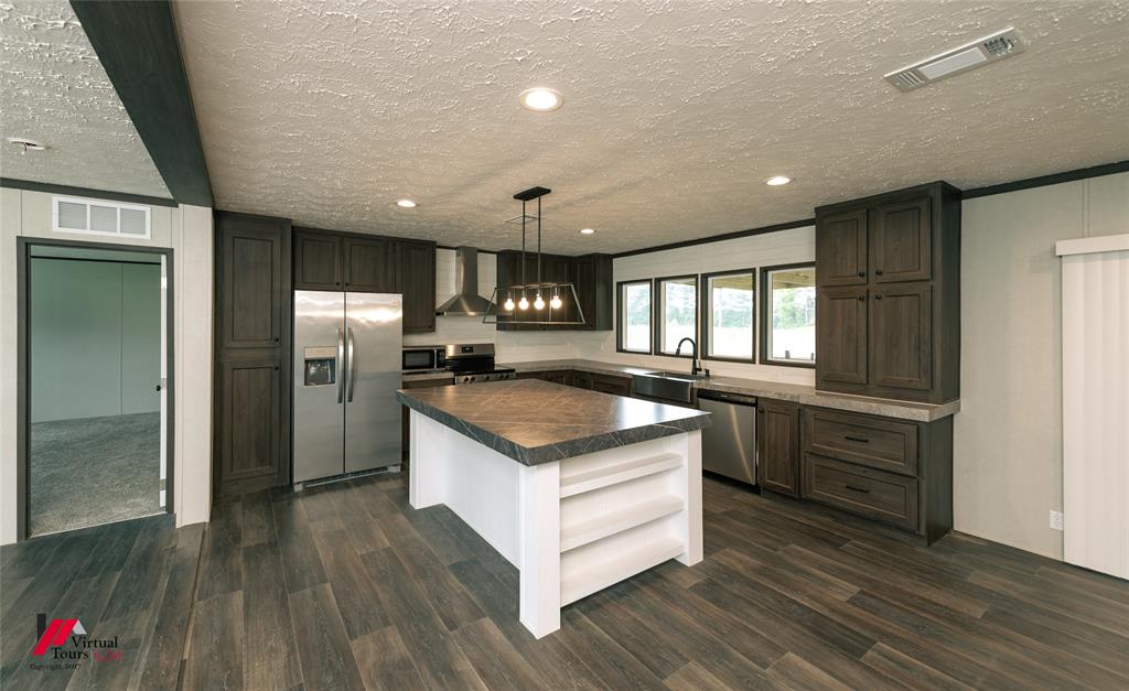 810 Chalybeate Springs Road Plain Dealing, LA 71064 - Photo 27 of 38 Large Island with Electrical Plug-Ins