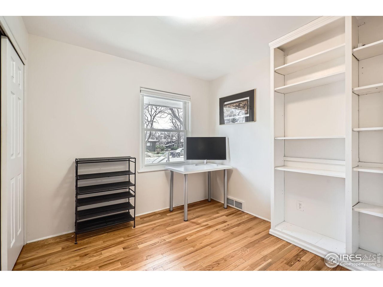 419 22nd Street Boulder, CO 80302 - Photo 18 of 38 a view of kitchen and hallway with wooden floor