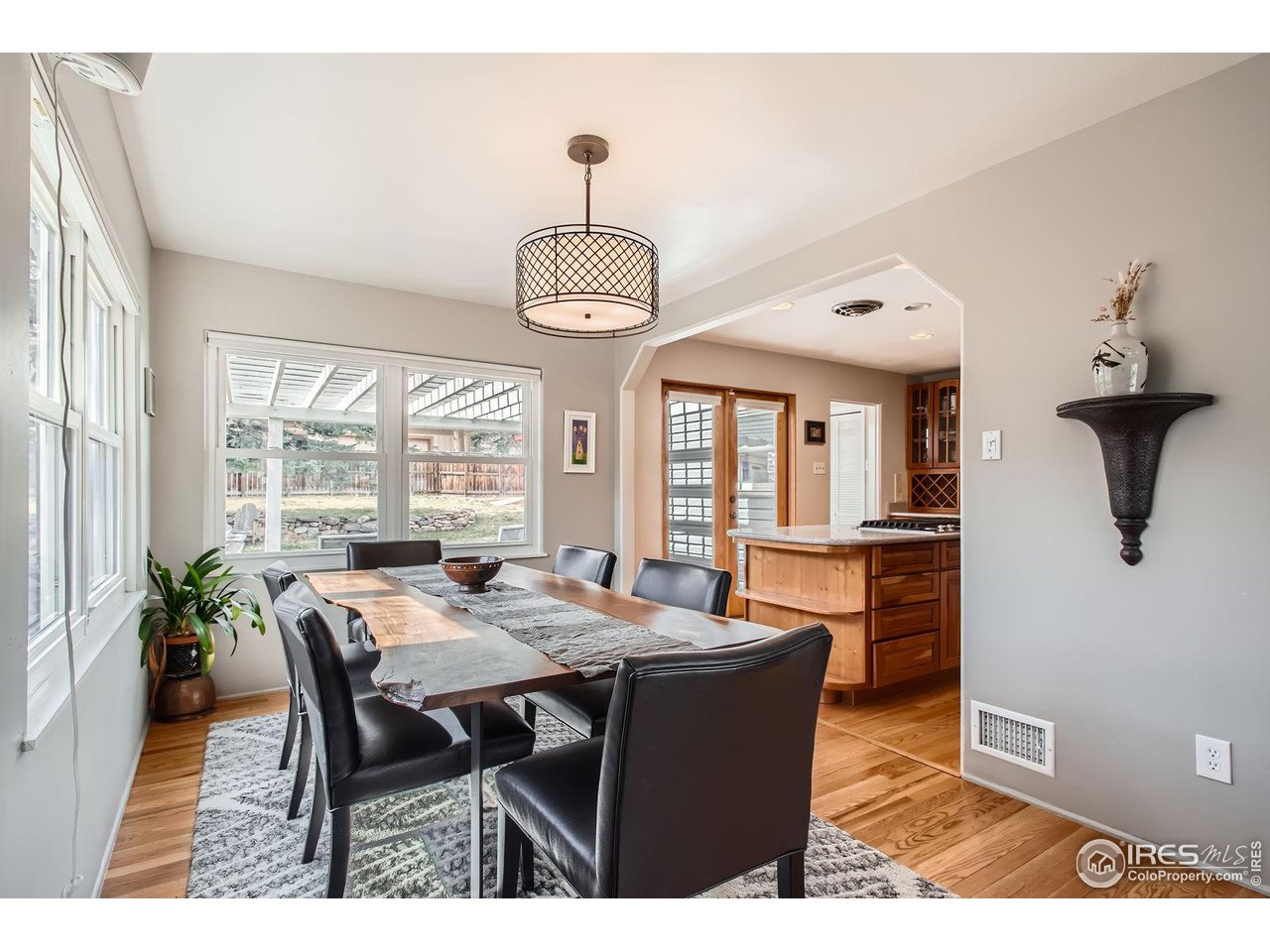 419 22nd Street Boulder, CO 80302 - Photo 6 of 38 a view of a dining room with furniture window and wooden floor