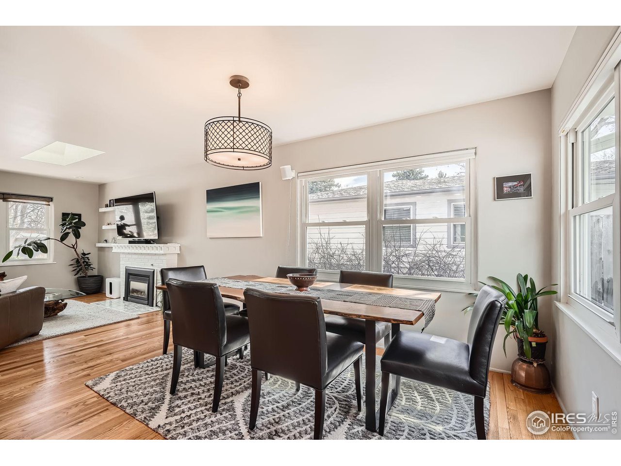 419 22nd Street Boulder, CO 80302 - Photo 7 of 38 a view of a dining room with furniture window and wooden floor