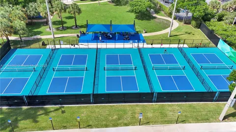 a backyard of a house with outdoor seating
