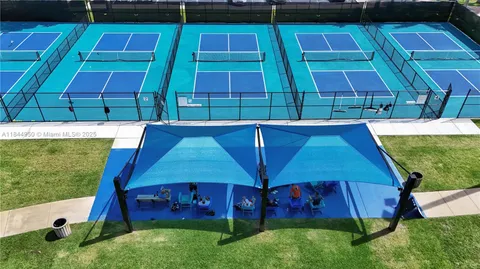 a view of a garden with sitting area