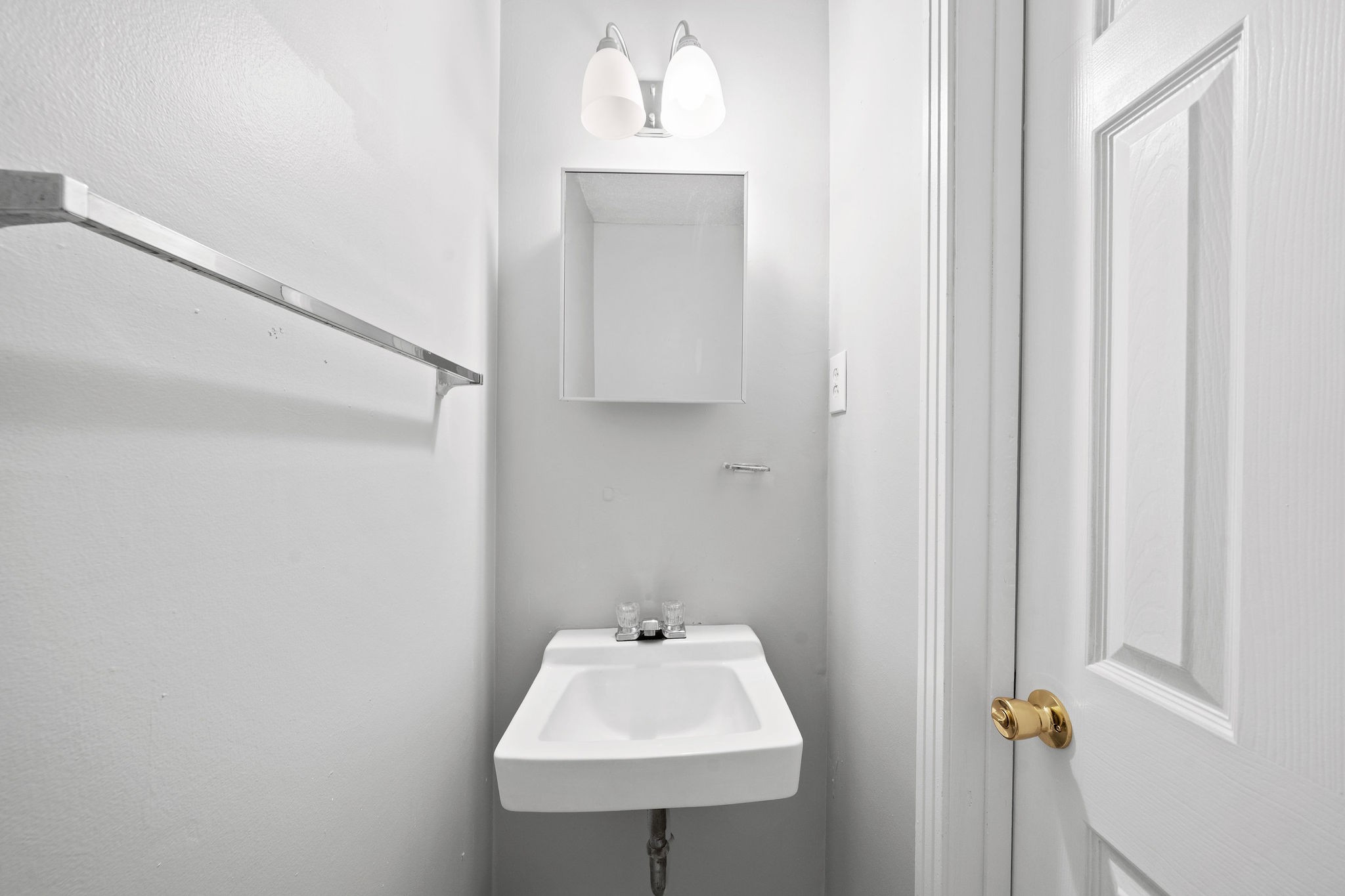 1231 State Line Road, Unit 46 Oak Grove, KY 42262 - Photo 8 of 12 a bathroom with a sink and a mirror