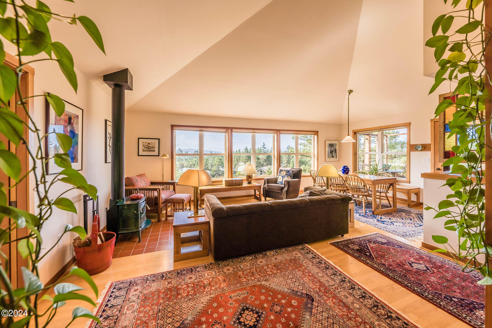 6855 Nestucca Ridge Road Pacific City, OR 97135 - Photo 40 of 44 a living room with furniture large window and wooden floor