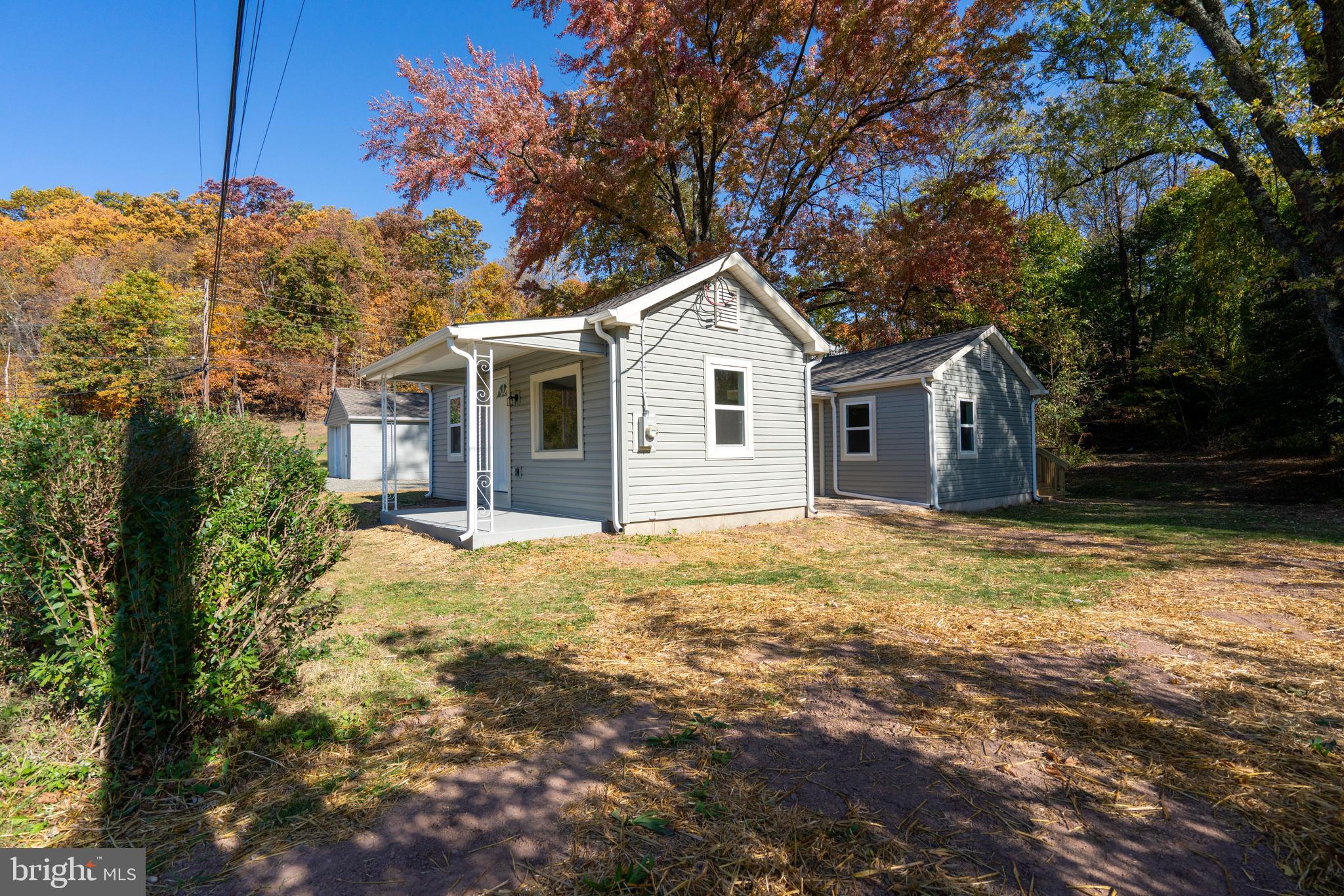 201 Hill Church Road Bechtelsville, PA 19505 - Photo 22 of 28 a view of a house with a yard