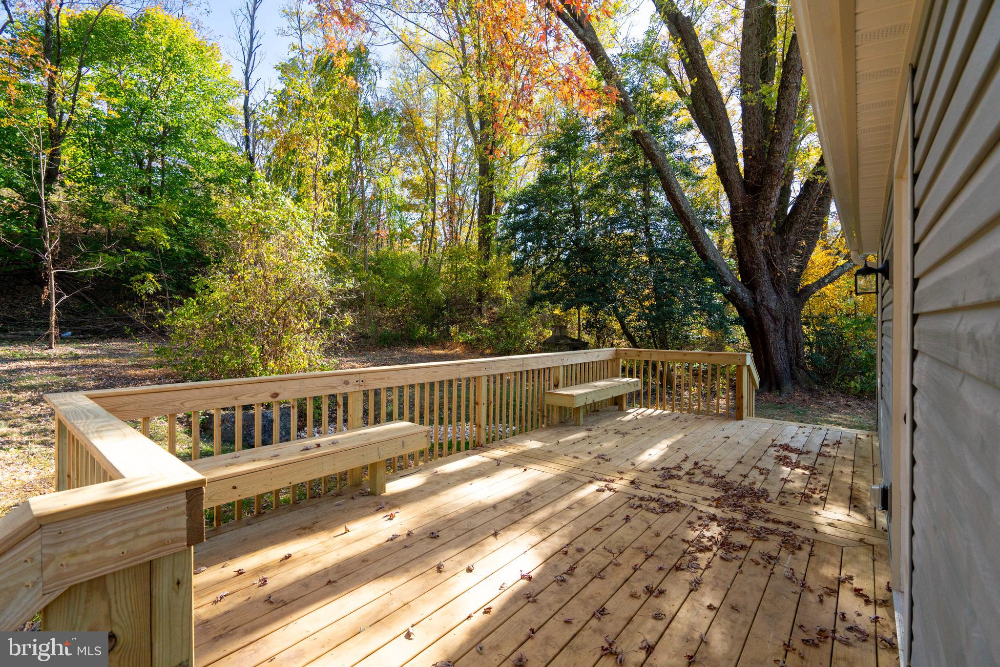 201 Hill Church Road Bechtelsville, PA 19505 - Photo 25 of 28 a view of a deck with a trees