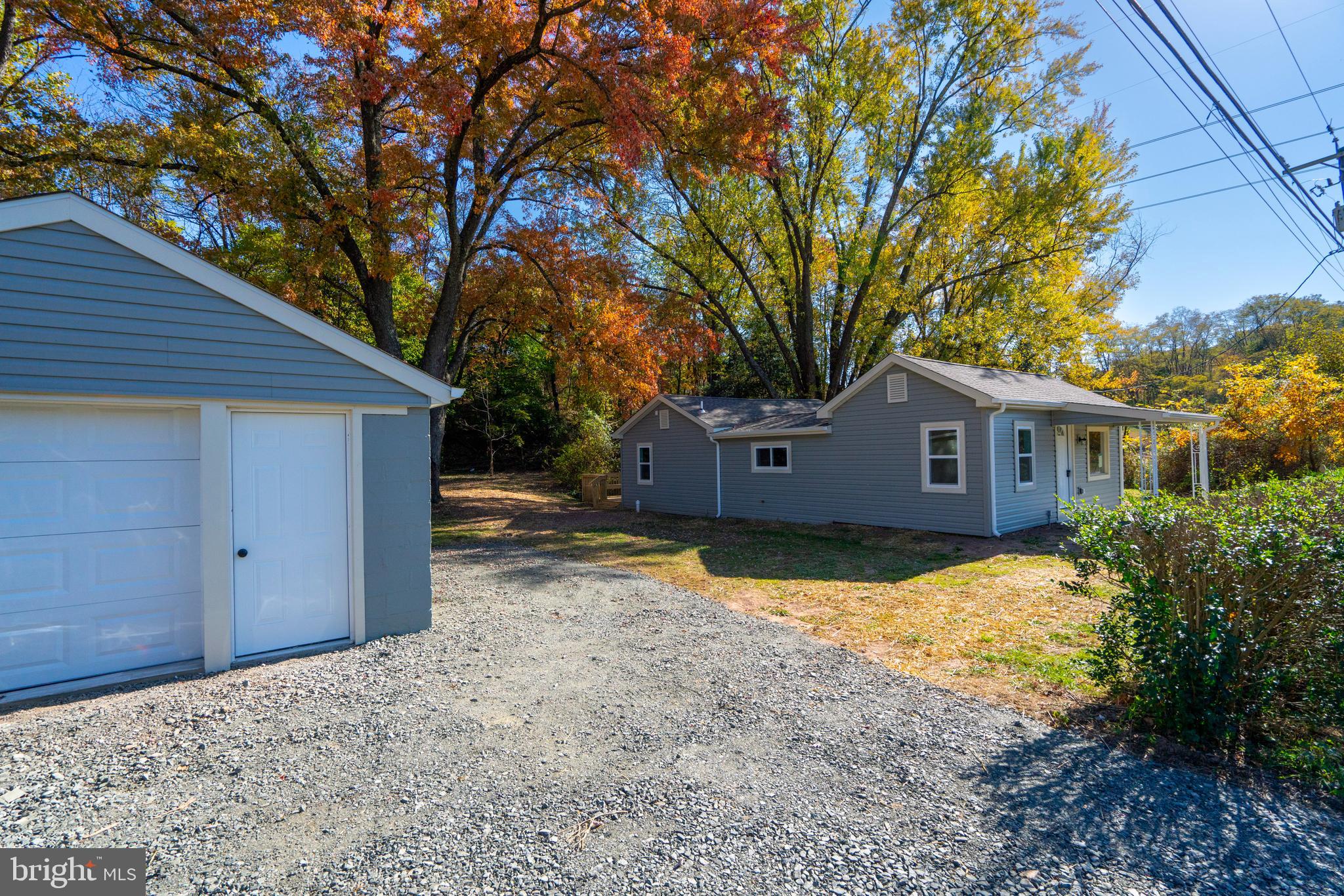 201 Hill Church Road Bechtelsville, PA 19505 - Photo 28 of 28 a front view of house with yard and trees in the background