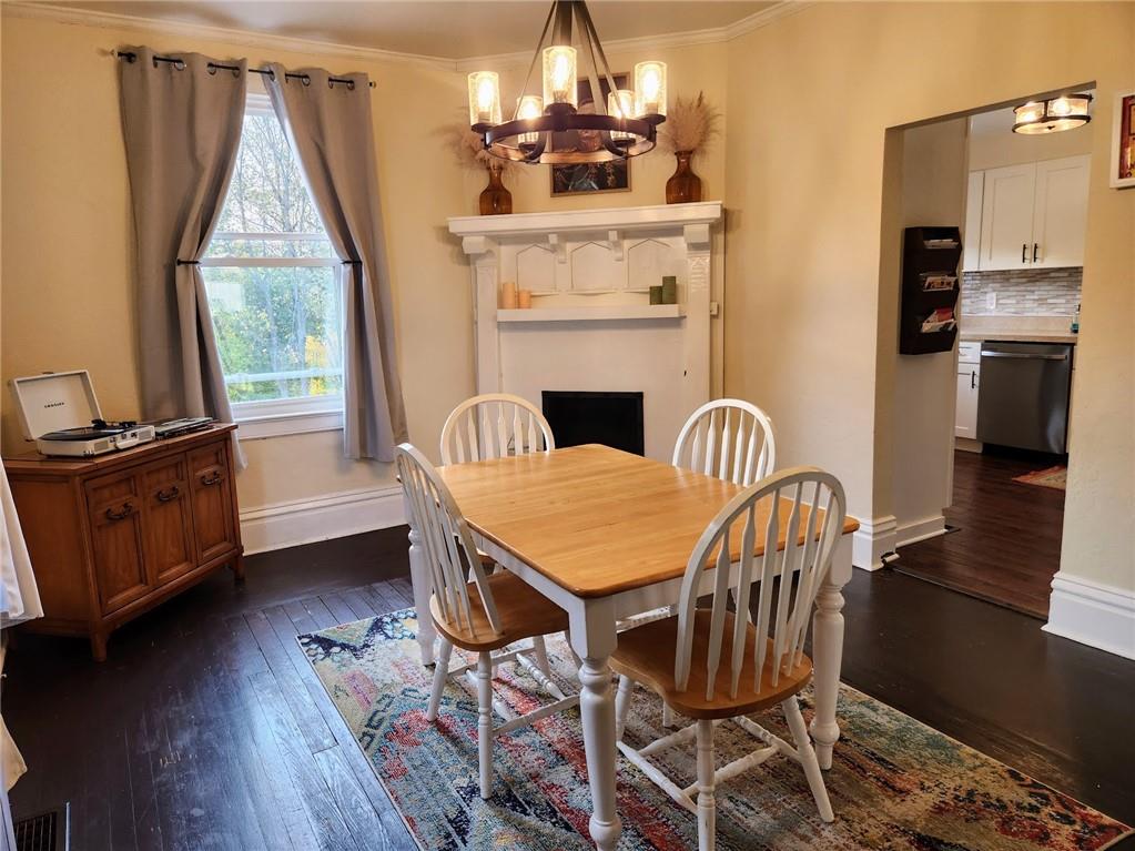 614 3rd Street Butler, PA 16001 - Photo 13 of 43 a view of a dining room with furniture window and wooden floor