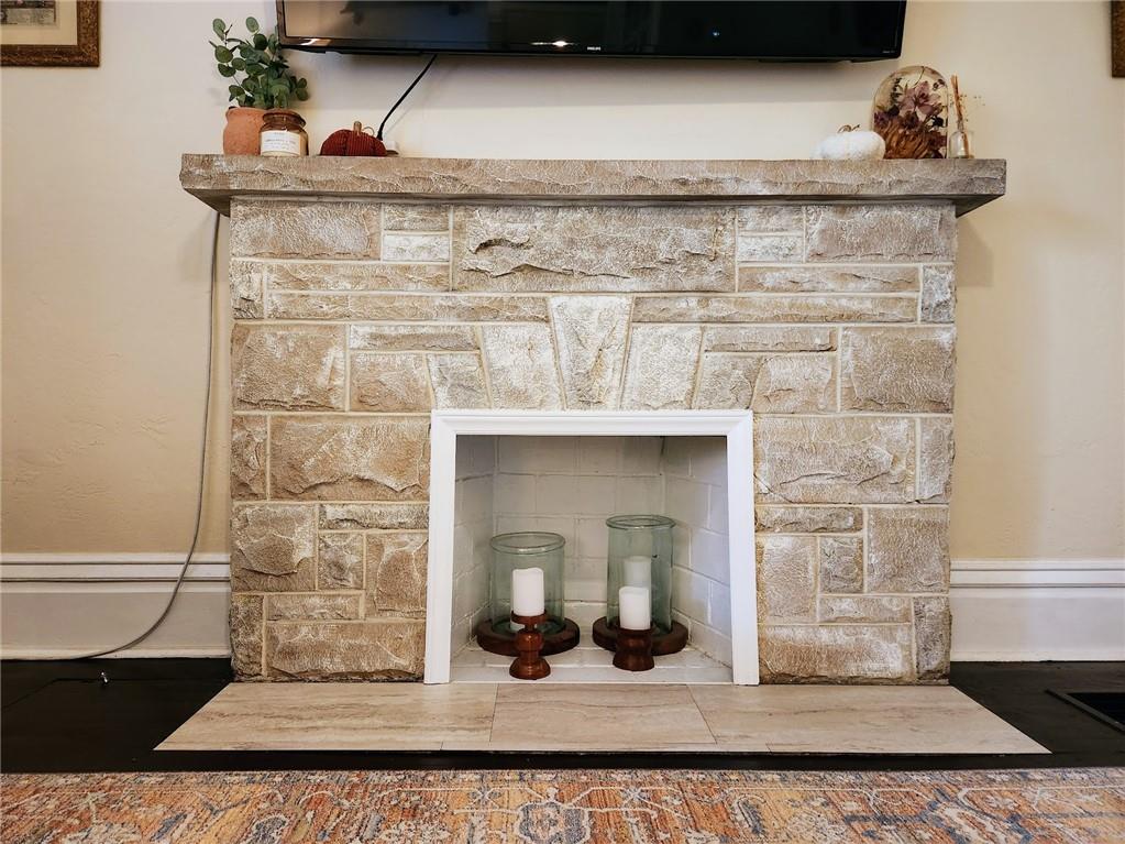 614 3rd Street Butler, PA 16001 - Photo 19 of 43 a view of a fireplace with wooden floor